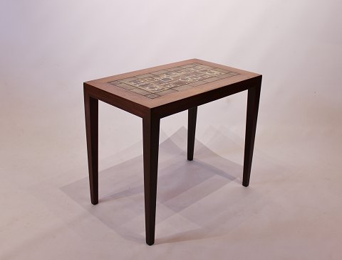 Sidetable in rosewood with Royal Copenhagen tiles by Severin Hansen for Haslev 
Furniture Factory.
5000m2 showroom.
