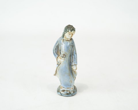 Stoneware figure with light blue glaze by L. Hjorth.
5000m2 showroom.
