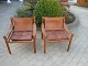 2 lounge chairs designed by Arne Norell in brown leather with patina model safari in good condition 5000 m2 showroom