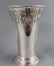Impressive large silver trophy with decorations  on  the top and bottom.   5000 m2 showroom.