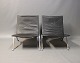 A pair of PK22 lounge chairs by Poul Kjaerholm and Fritz Hansen.5000m2 showroom.