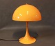 Orange Panthella mini table lamp by Verner Panton and Louis Poulsen.5000m2 showroom.
