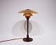 PH 3/2 tablelamp with amber colored shades by Poul Henningsen and Louis Poulsen, from the 1920s.5000m2 udstilling.