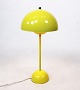Flowerpot table lamp, VP3, in yellow designed by Verner Panton in 1968 and manufactured by &Tradition.5000m2 showroom.