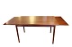Dining table with extentions in teak of danish design from the 1960s.5000m2 showroom.