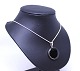 Necklace with 
Onyx pendant of 925 sterling silver stamped Dsi.
5000m2 showroom.
