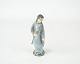 Stoneware figure with light blue glaze by L. Hjorth.
5000m2 showroom.

